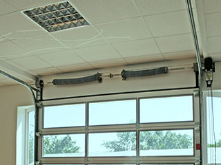 Garage Door Torsion Spring | Garage Door Repair St. Petersburg Torsion Spring Replacement | St. Petersburg